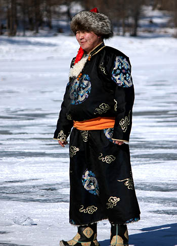 Traditional clothes of Mongolia - del (deel), boots, hat - By Mongolia  Travel and Tours
